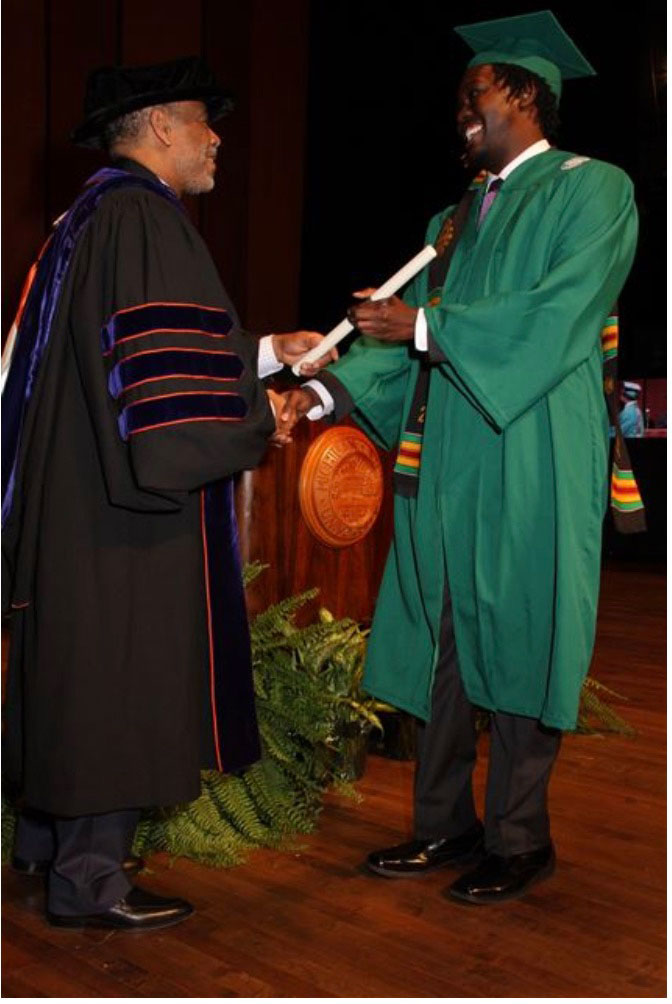 Ronald Harris receiving his diploma